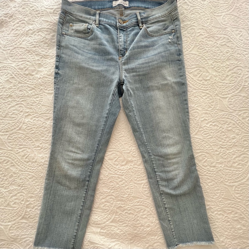 LOFT modern skinny jeans with fringe hem